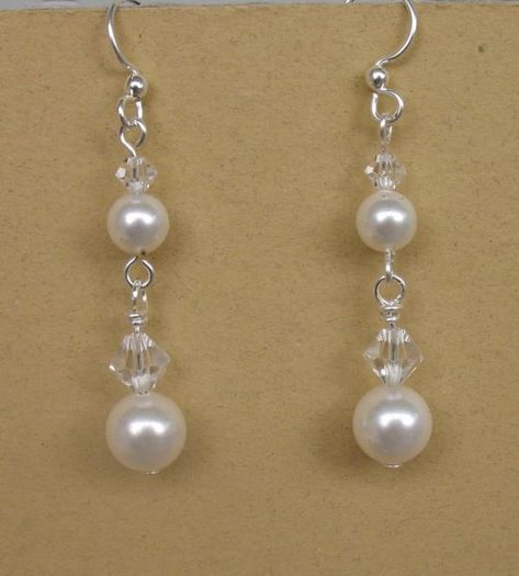 Pearl and Crystal Bridal Earrings ~ These pretty pearl dangle earrings are made with a 2 sizes of both swarovski pearls and crystals. Very delicate but still dramatic; adding the perfect accent without overwhelming you!  Earrings measure 2" from the top of the earwire. Options available at checkout for the earrings to be made in cream, white, or almond champagne pearls with either gold or silver finishes; however, any pearl and crystal color can be made as a custom order. Makes a lovely addition Gift For Bridesmaids, Crystal Earrings Wedding, Beaded Earrings Diy, Crystal Bridal Earrings, Jewelry Making Earrings, Pearl Dangle Earrings, Handmade Jewelry Tutorials, Bridal Earrings Pearl, Jewellery Ideas