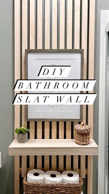 Slat Wall With Shelves Bathroom, Vertical Slats Wall Bedroom, Diy Wood Slat Wall Bathroom, Wood Panels Bathroom Wall, Wood Behind Toilet, Wood Slats Accent Wall Bathroom, Natural Wood Accent Wall Bathroom, Wood In Bathroom Wall, Wooden Slats Bathroom