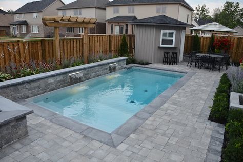 The Bobinskis 10 x 20 Inground rectangle is the perfect example of how a tight backyard can make a big impact with sheer descent waterfalls and much more. In Ground Pool Kits, Rectangle Swimming Pools, Swimming Pool Kits, Pool And Patio, Rectangle Pool, Pool Kits, Pools Backyard Inground, Swimming Pools Inground, Inground Pool