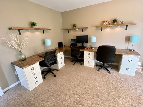 Two 8’ butcher block counters on wooden file cabinets. Fits 3 people. Three 4’ butcher block shelves finished the same. #diy #diyofficedesk 2 Person Office Design, Home Office Two Desks Layout Corner, Ikea 3 Person Desk, Farmhouse Style Home Office, Shared Home Office Ideas Small Spaces, 2 Desk Office Layout, Office For Two People Layout, Double Office Desk, Small Home Office For Two