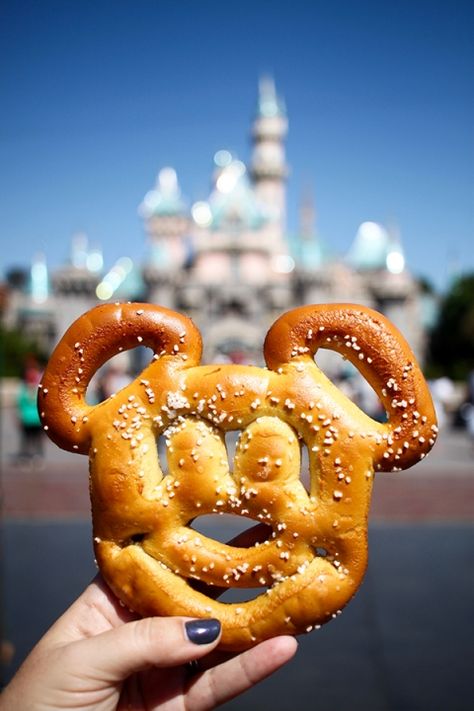 8. Mickey Pretzel from Pretzels Carts at Disneyland Park and Disney California Adventure Park – It’s a nice soft pretzel and I’m pretty sure the fine print on the receipt calls for it to be Instagrammed as partial payment. Just look at that adorable Mickey face! Mickey Pretzel, Disneyland Snacks, Minnie Mouse Cookies, Disney Desserts, Disney Treats, Disneyland Food, Disney California Adventure Park, Disney World Food, Disney Snacks