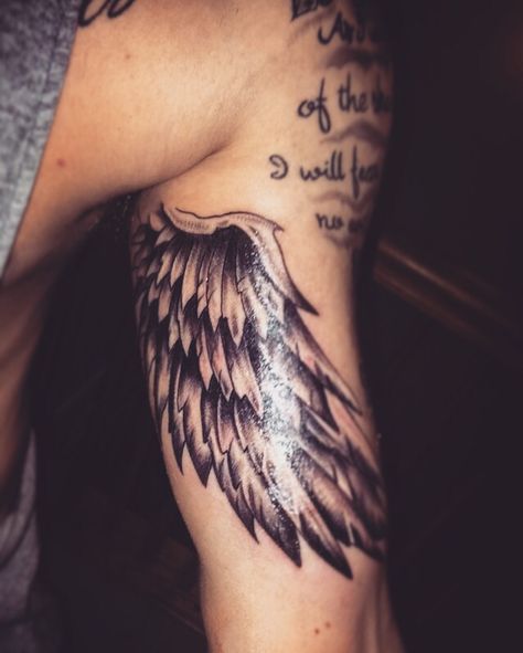 Angel wing tattoo Bicep Wing Tattoo Men, Angel Wings Tattoo Inner Bicep, Bicep Wing Tattoo, Tattoos Inner Arm, Best Arm Tattoos, Sternum Piece, Inside Bicep Tattoo, Arm Tattoos For Men, Bicep Tattoo Women