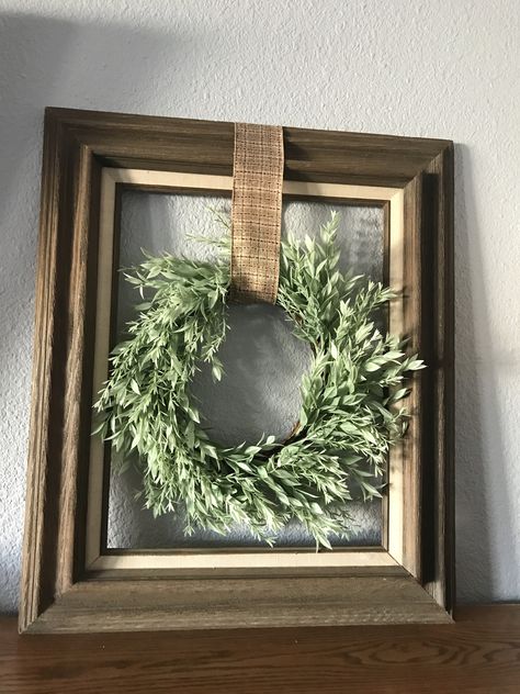 Wreath in frame Wreath With Frame Around It, Wreath In Bedroom Decor, Wreath In Bedroom, Frame And Wreath For Kitchen, Large Picture Frame Wreath, Picture Frame Wreath Christmas, Small Wreath Ideas, Picture Frame Christmas Wreath, Wreath In Frame