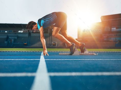 Professional male track athlete in set position by jacoblund. Male athlete on starting position at athletics running track. Runner practicing his sprint start in athletics stadium...#position, #set, #Male, #jacoblund Track Pictures, Photos Booth, Running Track, How To Start Running, Sports Photos, Athletic Men, Perfect Image, Social Media Icons, Senior Photos