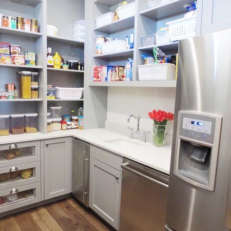 Can you imagine a pantry like this? Double oven, sink, dishwasher, ice maker (of course, the good ball ice) and full size refrigerator. It's another kitchen which is perfect for entertaining. What takes it over the top was when we matched the paint to the melamine shelves. Durable and Beautiful!  Twin Falls, Idaho soniabarneydesign.com Butler Pantry With Dishwasher, Butlers Pantry With Sink And Fridge, Butlers Pantry Sink Ideas, Walk In Pantry With Sink And Dishwasher, Dishwasher In Pantry, Pantry With Double Oven, Pantry With Sink And Dishwasher, Walk In Pantry With Fridge, Melamine Shelves