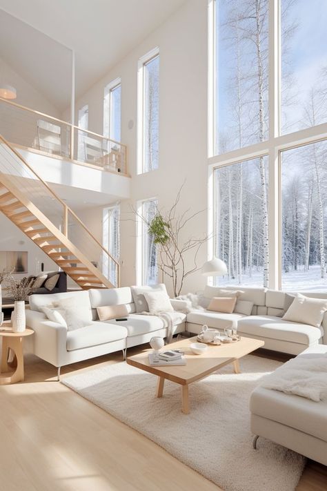 Two-story interior with large windows, outside Finnish winter nature with birch trees. White sofas and light wooden coffee table, soft luxurious white mat. Wooden stairs and glass railings White Modern Windows, Modern House With White Windows, White Windows Interior Modern, White Framed Windows, Two Story Living Room Windows, Modern White Windows, Refugee Housing, Big Windows Living Room, Wooden Floors Living Room