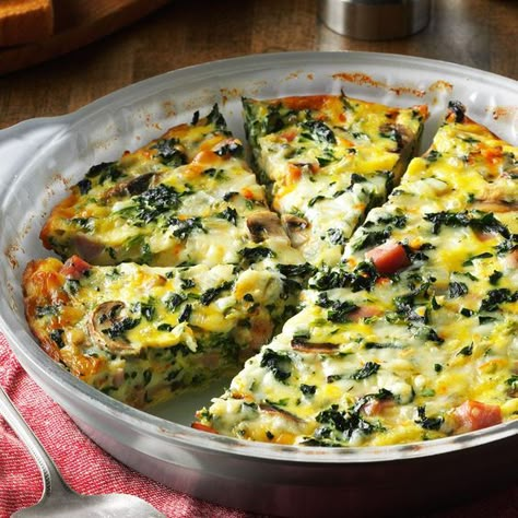 Crustless Spinach Quiche Recipe -I served this dish at a church luncheon and I had to laugh when one gentleman told me his distaste for vegetables. He, along with many others, were surprised how much they loved this veggie-filled quiche! —Melinda Calverley, Janesville, Wisconsin Crustless Spinach Quiche, Spinach Quiche Recipes, Squash And Ground Beef Recipes, Luncheon Ideas, Quiche Dish, Spinach Quiche, Quiche Recipe, Crustless Quiche, Breakfast Casseroles