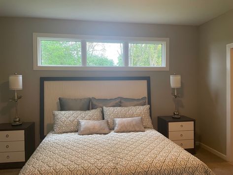 Narrow Window Above Bed, Transom Window Above Bed, High Window Above Bed, Double Window Bedroom, Horizontal Windows Bedroom, Transom Windows Bedroom, Bedroom With Window Behind Bed, Small High Windows, Lakehouse Renovation