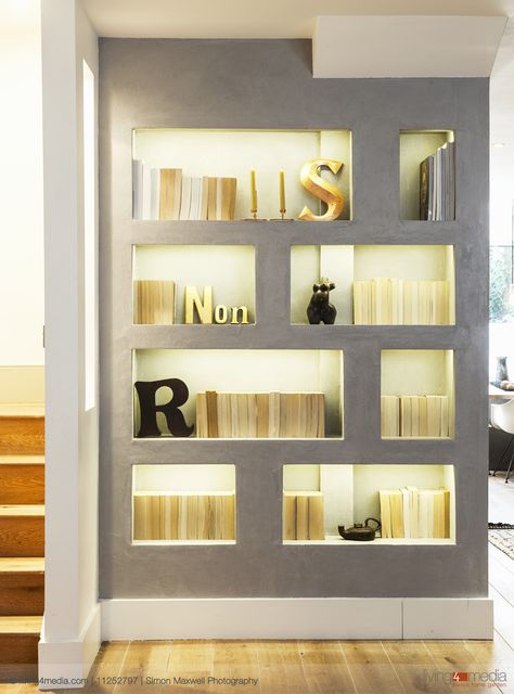 Modern grey wall with backlit shelving niches and partition screening staircase | © living4media | Simon Maxwell Photography | 11252797 Niches Design Wall, Wall Niches Ideas, Recessed Wall Niche Ideas, Niches Ideas, Wall Niche Ideas, Recessed Wall Niche, Wall Niches, Wall Partition Design, Niche Ideas