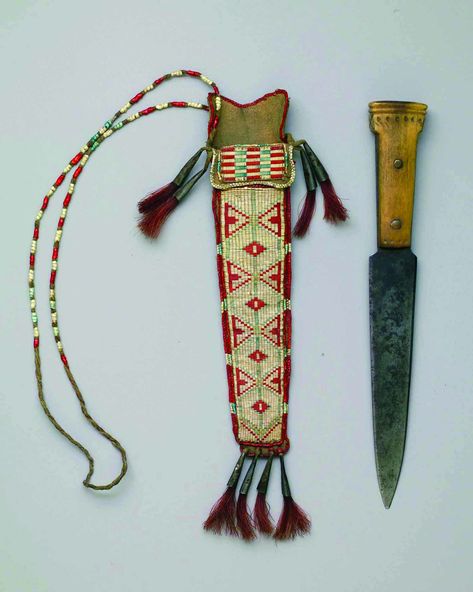 https://flic.kr/p/9ySnYw | Knife and Sheath | Knife and Sheath, ca. 1840, Northeast, Ojibwa, Knife: steel, bone, copper; Sheath: tanned hide, porcupine quills, seed beads, tin cones, red-dyed horsehair. WC8308030 Woodland Indians, Quill Work, Porcupine Quills, Fur Trade, Mountain Men, Indian Artifacts, Native American Artifacts, Native American Peoples, Native American Beadwork