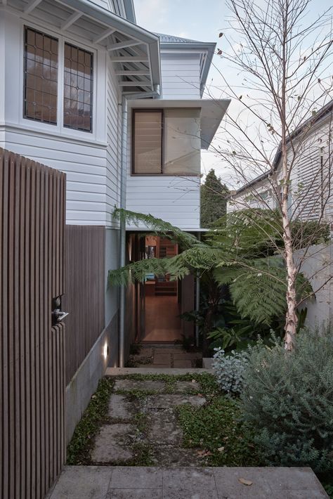 Bowen by Shaun Lockyer Architects • On a verdant Brisbane street lined with jacaranda trees, Bowen unfolds as a fashionable yet perennial expression of living in the subtropics. A renovation and extension of a prewar Queenslander by Shaun Lockyer Architects and interior designers Cedar + Suede, the project represents a dynamic interaction of the timely and the timeless. #suburbanhomes #garden #architecture #dreamhome #familyhome #australianhomes #pocketgarden #outdoorarea Farm Australia, What Is Interior Design, Top Architects, Victorian Cottage, Most Beautiful Gardens, The Local Project, Australian Architecture, New Farm, Architecture Old