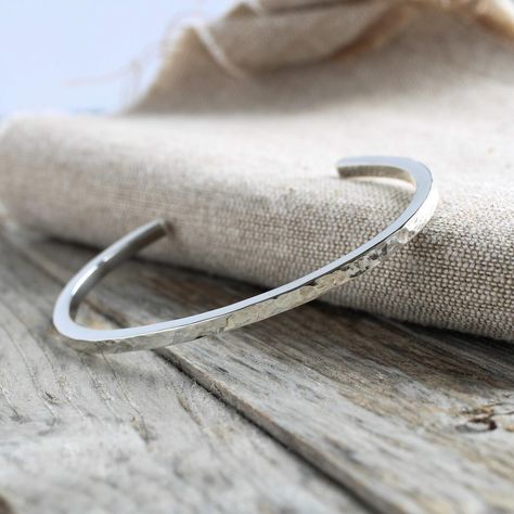 Solid sterling silver bangles, all made by hand and hallmarked. To find your perfect size use a measuring tape to measure the widest part of your hand snuggly - the base of your thumb across to below the pinky. 20cm - small fits a 6cm diameter bangle 21cm - medium fits a 6.5cm bangle 22cm - large fits a 7cm bangle Office Dimensions, Silver Cuff Bangle, Classy Earrings, Handmade Bangles, Sterling Silver Bangles, Recycled Silver, Sterling Silver Cuff, Hammered Silver, Cuff Bangles