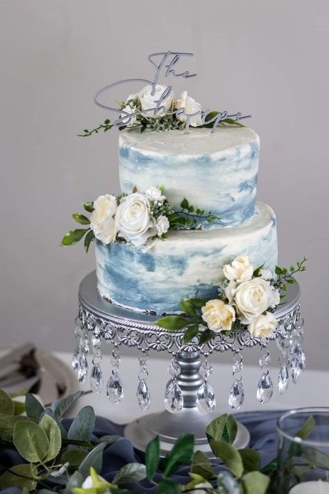 Two Tier Wedding Cake Dusty Blue, Dust Blue Wedding Cake, Blue Boho Wedding Cake, Small Dusty Blue Wedding Cake, Small Wedding Cake Ideas Elegant Blue, Dusty Blue And Yellow Wedding Cake, Dusky Blue Wedding Cake, Wedding Cake With Blue Accents, Dusty Blue And Sage Green Wedding Cake