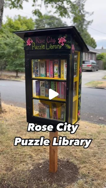 PDX Dinorama on Instagram: "Please welcome @rosecitypuzzlelibrary, a brand new puzzle exchange in Portland, OR. You’ll find this gorgeous, hand-painted puzzle swap on NE 56th between NE Alameda and NE Stanton in the Rose City Park neighborhood and on the Sidewalk Joy Map!

The creator and curator, Addie, told me she’s always loved puzzles and has fond memories of puzzling with her grandma Mildred. Addie started speed puzzling last year and wanted to share her jigsaw collection with the neighborhood. What a gift to the community! Thank you for spreading joy, Addie!

Everyone go follow @rosecitypuzzlelibrary! 🧩✨" Puzzle Library, Neighborhood Library, City Puzzle, Rose City, New Puzzle, City Park, The Neighborhood, Park City, The Rose