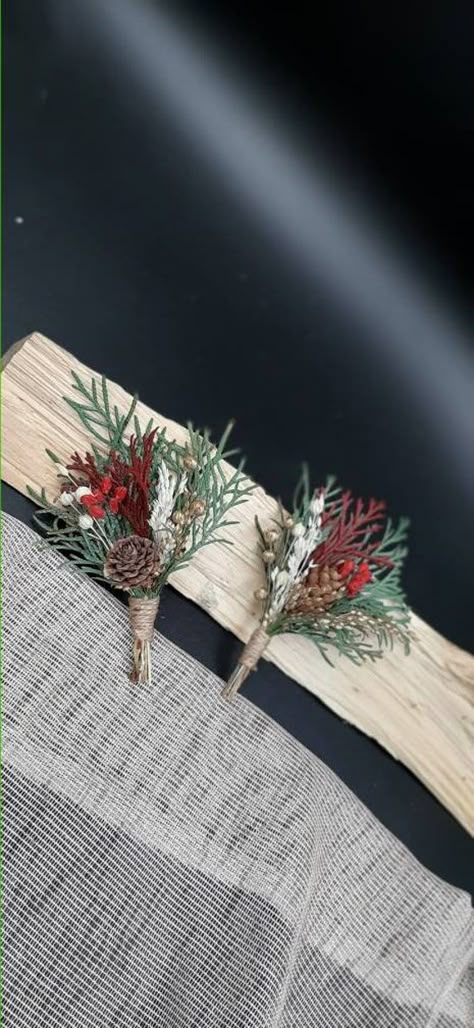 Rustic Boutonniere, Wedding boutonniere, Woodland wedding boutonniere, Groomsmen bottonhole decoration, dried natural flower butineer christmas wedding, is just the perfect addition for the groomsmen lapel. It is a natural composition that can become a keepsake, perfect for a natural rustic winter wedding. This listing is for ONE boutonniere. :) It is wrapped in jute and comes with in lapel pin. The price is for ONE boutonniere. I always refund shipping overages if they occur. IMPORTANT NOTE: As Christmas Wedding Outdoor, Christmas Wedding Buttonholes, Cowboy Christmas Wedding, Winter Boutineer Groomsmen, Christmas Wedding Photography, Christmas Wedding Reception Ideas, December Wedding Centerpieces, Winter Bridesmaid Bouquet, Christmas Wedding Arch