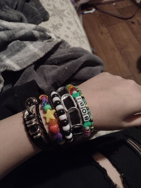 Band Bracelets Emo, Emo Rubber Bracelets, Layered Bracelets Grunge, Grunge Bead Bracelets, Emo Bracelets Aesthetic, Beaded Bracelets Aesthetic Y2k, Grudge Bracelets, Metalhead Bracelets, Emo Beaded Bracelets