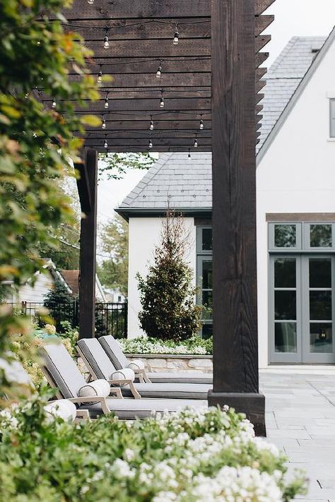 Dark Brown Stained Pergola with String Lights - Transitional - Deck/patio Stained Pergola, Exterior Design Backyard, Black Pergola, Design Backyard, Transitional Exterior, Pool Waterfall, Wooden Pergola, Deck Patio, Outdoor Fireplace