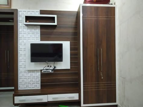 #lcd with almirah brown and white combination beautiful design and space proof you won't see more design open my Pinterest profile and follow me on Pinterest thank you Lcd Panel Design With Almira, Almirah With Led Panel, Almira With Tv Unit, Almirah With Tv Unit, Modern Lcd Panel Designs, Tv Unit With Wardrobe, टीवी यूनिट डिजाइन, टीवी यूनिट, Lcd Unit Design