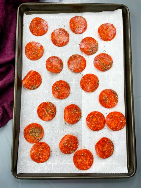 This Easy Crispy Pepperoni Chips recipe is the perfect snack that you can bake or air fry. Keep these crisps on hand for whenever you're craving a treat. Baked Pepperoni, Crispy Pepperoni, How To Make Pepperoni, Pepperoni Chips, Pizza Chips, Homemade Ranch Seasoning, Keto Grocery List, Meal Prep Guide, Bbq Seasoning