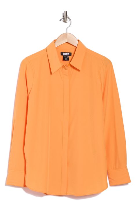 Stroll into the office looking your best in this lightweight button-up shirt cut from flowy fabric. 28" length (size Small) Hidden-button placket Spread collar Long sleeves 88% polyester, 12% spandex Machine wash, tumble dry Imported Button Up T Shirt, Orange Button Up, Orange Button-up Summer Top, Summer Orange Button-up Top, Solid Rayon Button-up Shirt, Casual Orange Button-up Blouse, Orange Button-up Shirt With Button Closure, Flowy Fabric, Cut Shirts