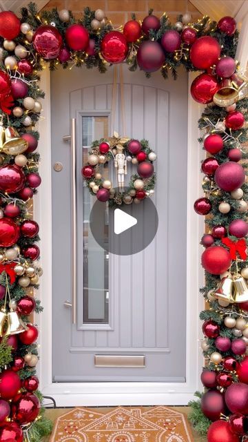 Brittany Thomas on Instagram: "CHRISTMAS DOOR ARCH 2024 ✨🎅♥️🌲

I’ve stuck with the red/burgundy theme on the door this year as I want this colour to flow through the house 😍 
I’ve also tried something slightly different this year where I’ve  added more garland to the bottom so it drapes onto the floor to help cover the stands 😍✨

Lights on my garland are from @festivelightsltd - these are the warm white LED cluster connectable lights ✨ *ad

#christmasinspo #christmasdecor #christmastime #deckthehalls #homeinspo #homedecor #homeinteriors #interiordesign #interiorinspo #holidaydecor #holidayseason #holidaydecorating #ltkhome #twinklelights #cozychristmas #christmasporch #garland #christmasideas" Bauble Door Garland, Xmas Theme Ideas, Christmas Door Arch, Window Garland, Door Arch, Xmas Theme, Red Ball, Christmas Inspo, Stand Light