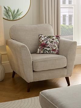 How to Decorate A Long, Narrow Living Room Armchair With Footstool, Two Armchairs Living Room, Living Room Lighting Ideas, Long Narrow Living Room, Room Lighting Ideas, Neutral Sofa, Narrow Living Room, Comfy Armchair, Bedroom Wall Colors