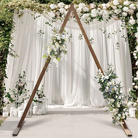 Click link to order! This arch is so stylish and so affordable!!! Add some fabric and flowers for an amazing display. Easy to assemble. Great for any wedding budget or style - classic, boho / bohemian, chic, country, farm, classy, western, classy, romantic, alternative, modern, vintage, whimsical, rustic, garden party, casual, formal, natural, or even tropical! **Check out my profile for more affordable ideas!!!** Wedding Aesthetic Bride, Triangle Backdrop, Arch For Wedding Ceremony, Fabrics Flowers, Wood Arches, Wooden Wedding Arch, Arch For Wedding, Wooden Wedding Arches, Aesthetic Bride