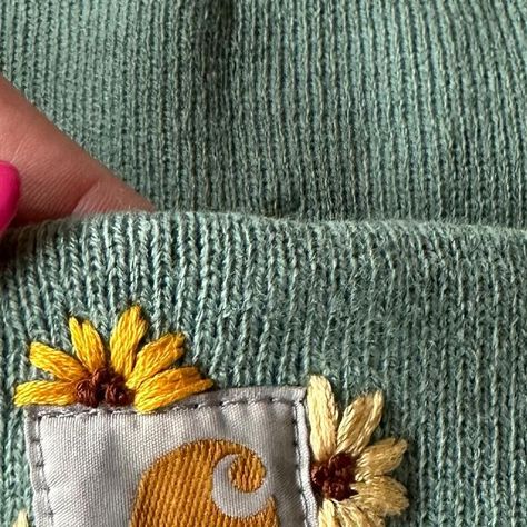 Diy Clothing Embroidery Courses | Hand Embroidery Kits on Instagram: "Comment SUNFLOWER and I’ll send you the link to this Carhartt beanie pattern. Hand embroidery makes a great hobby for busy mamas. Let’s make 2024 the year you commit to have some me time. The year you learn a new skill. The year you find something you love to do, for YOU. *not affiliated with Carhartt" Carhartt Embroidery Diy, Carhartt Hat Embroidery Diy, Embroidered Carhartt Beanie Diy, Carhartt Beanie Embroidery Flowers, Manly Embroidery, Embroidery Carhartt Beanie, Carhartt Beanie Embroidery, Carhartt Embroidery, Sunflower Hand Embroidery