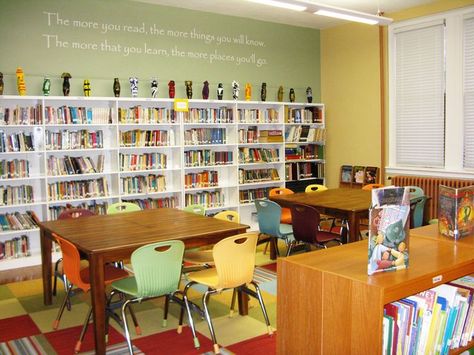 School Library Decorating Ideas | An inspirational wall decal in the library room with books in the ... Small School Library Design, School Library Quotes, Elementary Library Decorations, Small Library Design, Library Design Ideas, Library Renovation, School Library Decor, Small Library, School Library Design