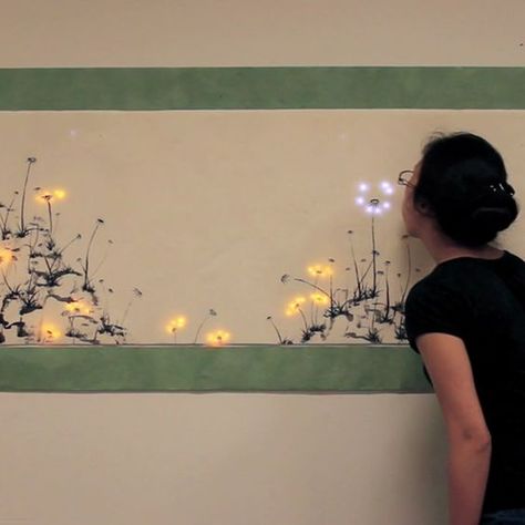 Blowing on interactive dandelion art makes seeds disperse and grow (Wired UK) Interactive Painting, Doctoral Student, Dandelion Field, Dandelion Painting, Interactive Art Installation, Dandelion Art, Interactive Museum, Interactive Exhibition, Interactive Walls