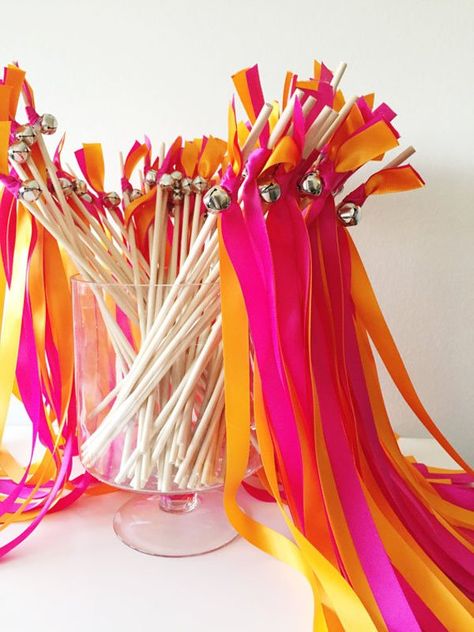 10 Wedding Exits Guests Will Always Remember Wedding Wands With Bells, Cuban Wedding, Wedding Wands, Wedding Exit, Ribbon Wands, Top Wedding Trends, Wedding Send Off, Spanish Wedding, Wedding Exits