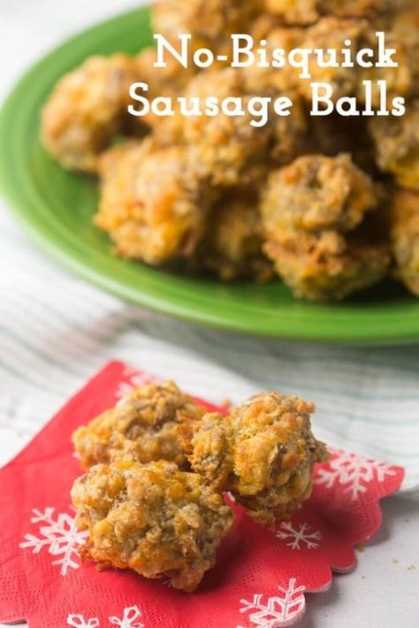 These easy sausage balls from scratch are a classic party favorite without the need for boxed mixes! Everyone at your holiday party or potluck will love them, and they are also perfect for a Christmas breakfast treat! Your family won't be able to get enough. Sausage, cheddar cheese, flour, baking soda, baking powder, salt, butter, and a little milk...so easy and delicious! | recipe from Chattavore.com #easyrecipe #easyappetizer #Christmasrecipe #sausageballs #sausageballrecipe #... Best Sausage Ball Recipe, Easy Sausage Balls, Easy Sausage Balls Recipes, Sausage Balls Bisquick, Sausage Cheese Balls, Cream Cheese Sausage Balls, Sausage Balls Recipe, Sausage Balls, Jimmy Dean