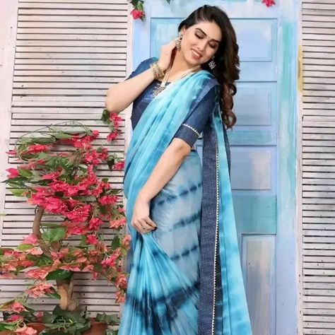 *Shibori Tie Dye Saree With Blouse Piece* *Size*: Free Size(Saree Length - 5.5 metres) Free Size(Blouse Length - 0.8 metres) *Color*: Turquoise *Fabric*: Poly Silk *Type*: Saree with Blouse piece *Style*: Tie & Dye *Design Type*: Bhagalpuri *Blouse Type*: Separate Blouse Piece *COD Available* *Free and Easy Returns**: Within 7 days of delivery. No questions asked ⚡⚡ Hurry, 6 units available only Hi, check out this product available at best price for you. Tie Dye Saree, Free Size Blouse, Turquoise Fabric, Shibori Tie Dye, Color Turquoise, Tie Dye Designs, Saree With Blouse, Blouse Length, Shibori