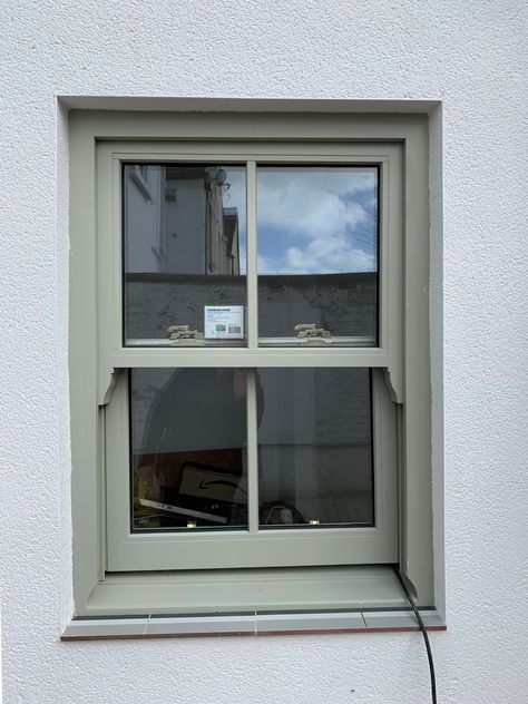 Accoya sash window manufactured by Medina Joinery. Window painted in Farrow & Ball French Grey Farmhouse Sash Windows, Cottage Sash Windows, Green Sash Windows, White House With Green Windows, Grey Green Windows Exterior, Painted Sash Windows, Sash Windows Exterior, French Grey Windows, Cottage Windows Ideas