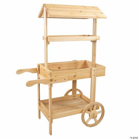 This lovely wheeled garden planter has the appearance of an old-fashioned market stall. It features a sturdy garden flower cart that makes it easy to access ... Small Flower Stand Ideas, Small Produce Stand, Flower Stand Ideas Outdoor, Diy Flower Cart, Market Cart, Firewood Racks, Country Market, Hammock Accessories, Dorm Storage