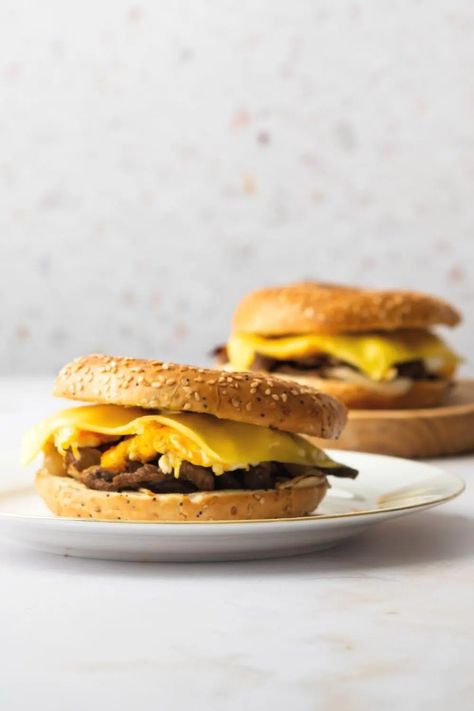 McDonalds Steak Bagel Recipe Made In Under 30 Minutes Steak Bagel, Mcdonald's Steak Egg And Cheese Bagel, Steak Egg And Cheese Bagel, Egg And Cheese Bagel, Shaved Steak, Mcdonalds Recipes, Steak Eggs, Bagel Breakfast Sandwich, Egg And Cheese Sandwich