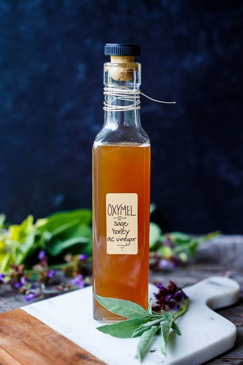 Made with just three ingredients, Oxymel is an ancient elixir used to heal and soothe sore throats, coughs, and colds. Easy and Delicious! Sage Oxymel, Feasting At Home, Turmeric Shots, Dry Throat, Sooth Sore Throat, Immune Boosting Foods, Raw Apple Cider Vinegar, Vinegar And Honey, Ginger And Honey