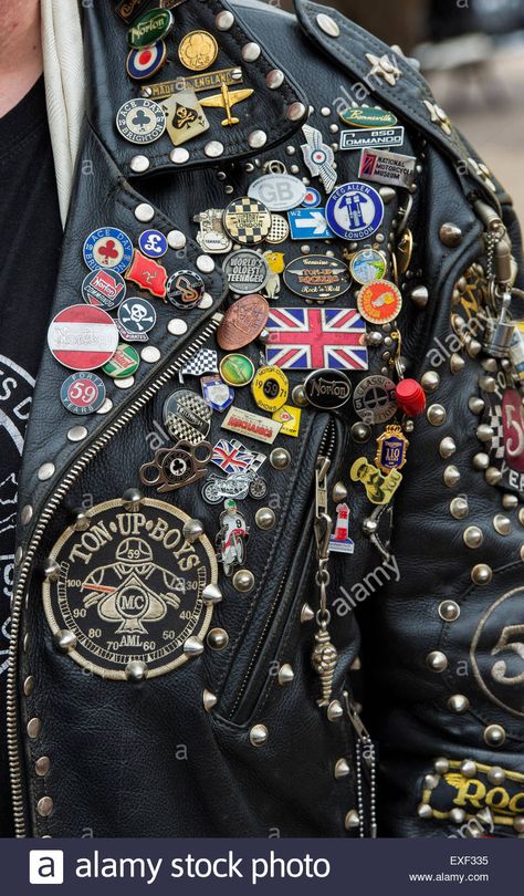 Download this stock image: Rockers leather jacket covered in studs, patches and badges. Ton up Day, Jacks Hill Cafe, Towcester, Northamptonshire, England - EXF335 from Alamy's library of millions of high resolution stock photos, illustrations and vectors. Alexander Aesthetic, Math Wizard, Punk Leather Jacket, Leather Jacket Patches, Rock Fest, Punk Jacket, Punk Culture, Punk Pins, Battle Jacket