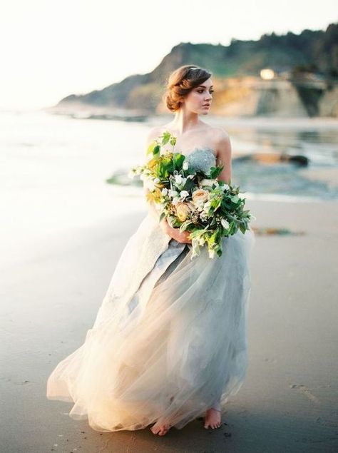 These dresses fit beach brides perfectly. If you plan to be married on the beach, check out these gowns for inspiration! Erich Mcvey, Ethereal Wedding Dress, Grey Wedding Dress, Ethereal Wedding, Beach Bride, Seaside Wedding, Blue Wedding Dresses, Bridal Photos, Wedding Photography Inspiration