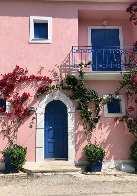 Asos, Kefalonia- Greece Read for our tips and the route we took in Kefalonia, Greece. pink house | blue door | ivy House Colors Outside, Colorful Doors On Houses, Navy House Pink Door, Pink And Blue House, Colour House, Houses Painting, House Beautiful, Pink Houses Exterior, Pink House Exterior Modern