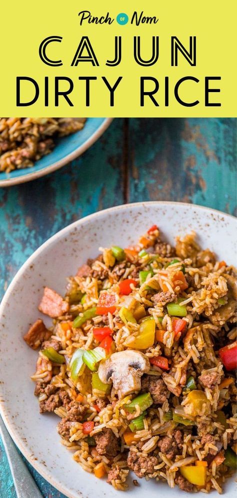 This Cajun Dirty Rice is our new and improved version of one of our most popular recipes this year! #cajun #dirtyrice Cajun Dirty Rice Recipe, Cajun Dirty Rice, Dirty Rice Recipe, Cajun Rice, New Orleans Recipes, Pinch Of Nom, Dirty Rice, Haitian Food Recipes, Gumbo Recipe