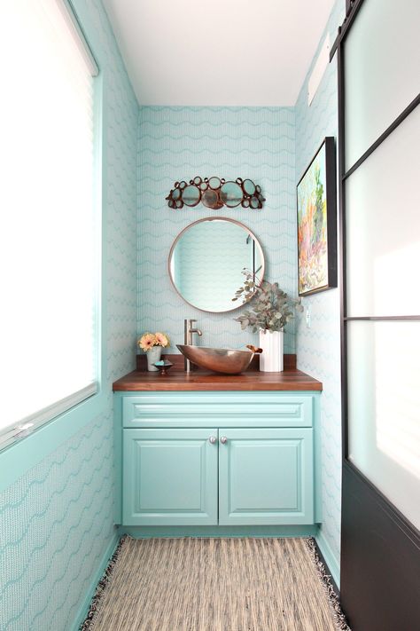 Turquoise and Copper Powder Room Makeover REVEAL | Handmade Copper Sink, Sprigs on Ocean Wallpaper, Walnut Counters, Colorful DIY Bathroom Makeover Before   After Bathroom Cabinets White, Storage Ideas Bathroom, Walnut Bathroom, Wallpaper Powder Room, Aqua Bathroom, Turquoise Bathroom, Glass Light Fixtures, Small Powder Room, Copper Sink Bathroom