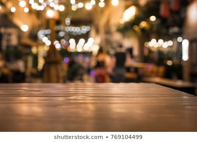 Wood table top with blur of lighting in night cafe restaurant (community) background/selective focus. Real Wood Table, Background For Product, Bar Background, Gold Bokeh, Night Cafe, Blurred Lights, At Restaurant, Fashion Typography, Download Background