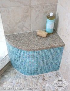 Beautiful blue tile shower bench created by Normandy Designer Ann Stockard. Bathroom Remodel Diy Budget, Bathroom Remodel Diy, Pebble Shower, Rustic Bathroom Remodel, Pebble Floor, Remodel Diy, Diy Budget, Small Remodel, Floor Remodel