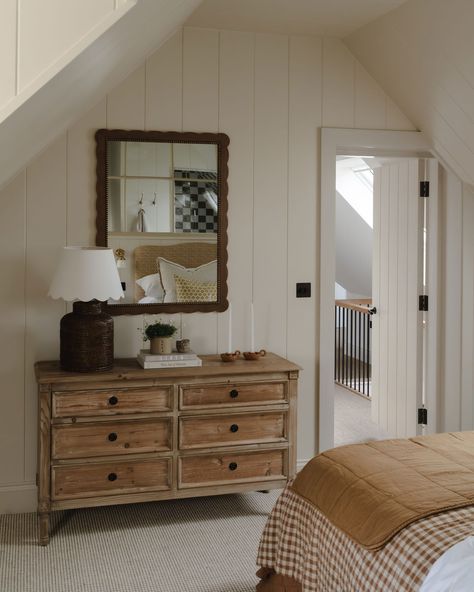 The primary guest bedroom in this project by House Nine Design perfectly balances a charming palette of neutrals with textural elements like Attica Studios' 'Santiago Scalloped Mirror.' Writers Cabin, Small Cottage Bedroom Ideas, House Nine Design, Small Cottage Bedroom, Scalloped Mirror, Attic Ideas, Cottage Bedroom, Attic Bedroom, Small Cottage