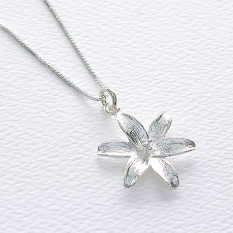 "Sterling Silver Lily Flower Pendant Necklace, Mothers Day Jewelry Gift, Anniversary Necklace, Botanical Blossom Nature Charm, FREE SHIPPING OVERVIEW: * Beautiful, elegant, bright and sturdy 14, 16, 18, or 20 inch chain. Choose from a 0.7 mm, 925 sterling silver box chain or a 1 mm petite 925 sterling silver cable link chain. * Sterling silver lily flower pendant 18 mm width, 24 mm length * All components are 925 sterling silver * Gift box with elastic hair band and charm * Wrapped polishing clo Nature Necklaces, Mothers Day Jewelry, Lily Necklace, Pretty Jewelry Necklaces, Anniversary Necklace, Loop Pendant, Silver Gift Box, Flower Pendant Necklace, Cool Necklaces