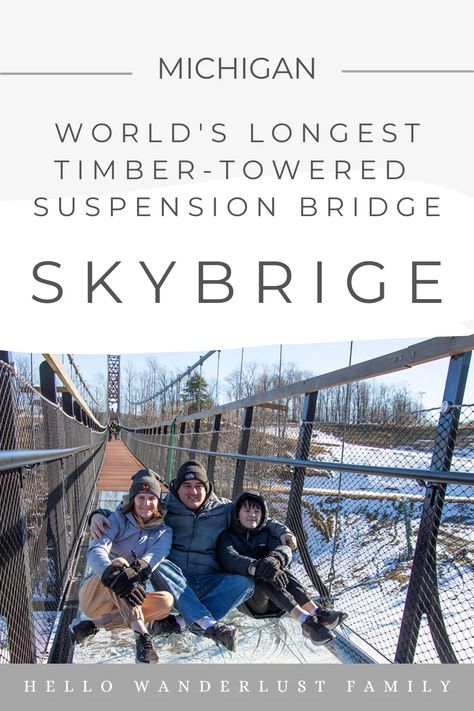 If you are looking for a unique and thrilling adventure in Michigan, then look no further than SkyBridge Michigan! Located at Boyne Mountain in Northern Michigan, SkyBridge is the longest timber towered suspension bridge in the world and spans an incredible 800 feet across a deep valley. With an awe-inspiring view of the mountain,and forests. SkyBridge is one of the best things to do in Michigan. Skybridge Michigan, Winter Vacation Packing, Boyne Mountain Resort, Boyne Mountain, Things To Do In Michigan, Affordable Family Vacations, Michigan Adventures, Mackinaw City, Indoor Waterpark