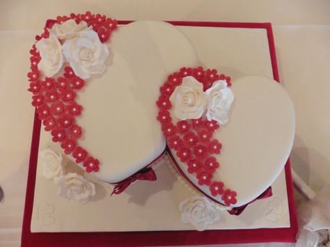 Double Heart Wedding Cake - 10" fruit and 8" vanilla sponge #cavendishcakes Double Heart Cake Designs, Double Heart Cake, Heart Shaped Wedding Cakes, Heart Cake Design, Heart Wedding Cake, Anniversary Cake Designs, 50th Wedding Anniversary Cakes, Wedding Cake Pearls, Shaped Cakes