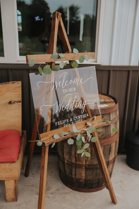 Acrylic board on easel with eucalyptus Art Easel Wedding Sign, Acrylic Easel Wedding, Wedding Picture Stand, Wedding Easel Ideas, Acrylic Board Wedding, Wedding Sign Holder, Welcome Easel, Jesus Wedding, Welcome Sign For Wedding