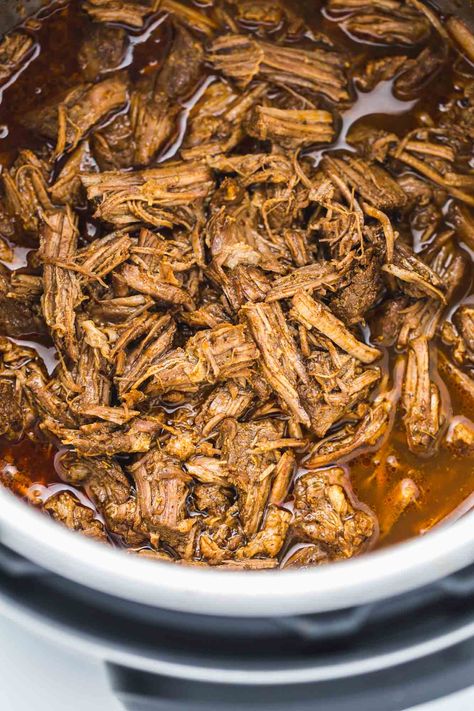 This Mexican shredded beef holds a TON of flavor! Tender, fall apart beef in a rich sauce to make restaurant-quality shredded beef tacos, burritos, quesadillas, enchiladas, or rice bowls. Make this over the stovetop, in the Instant Pot, or in the slow cooker. Shredded Beef Stew, Shredded Beef Burritos, Quick Beef Stew, Cross Rib Roast, Beef Burrito Recipe, Instant Pot Stew, Shredded Beef Recipes, Shredded Beef Tacos, Mexican Shredded Beef